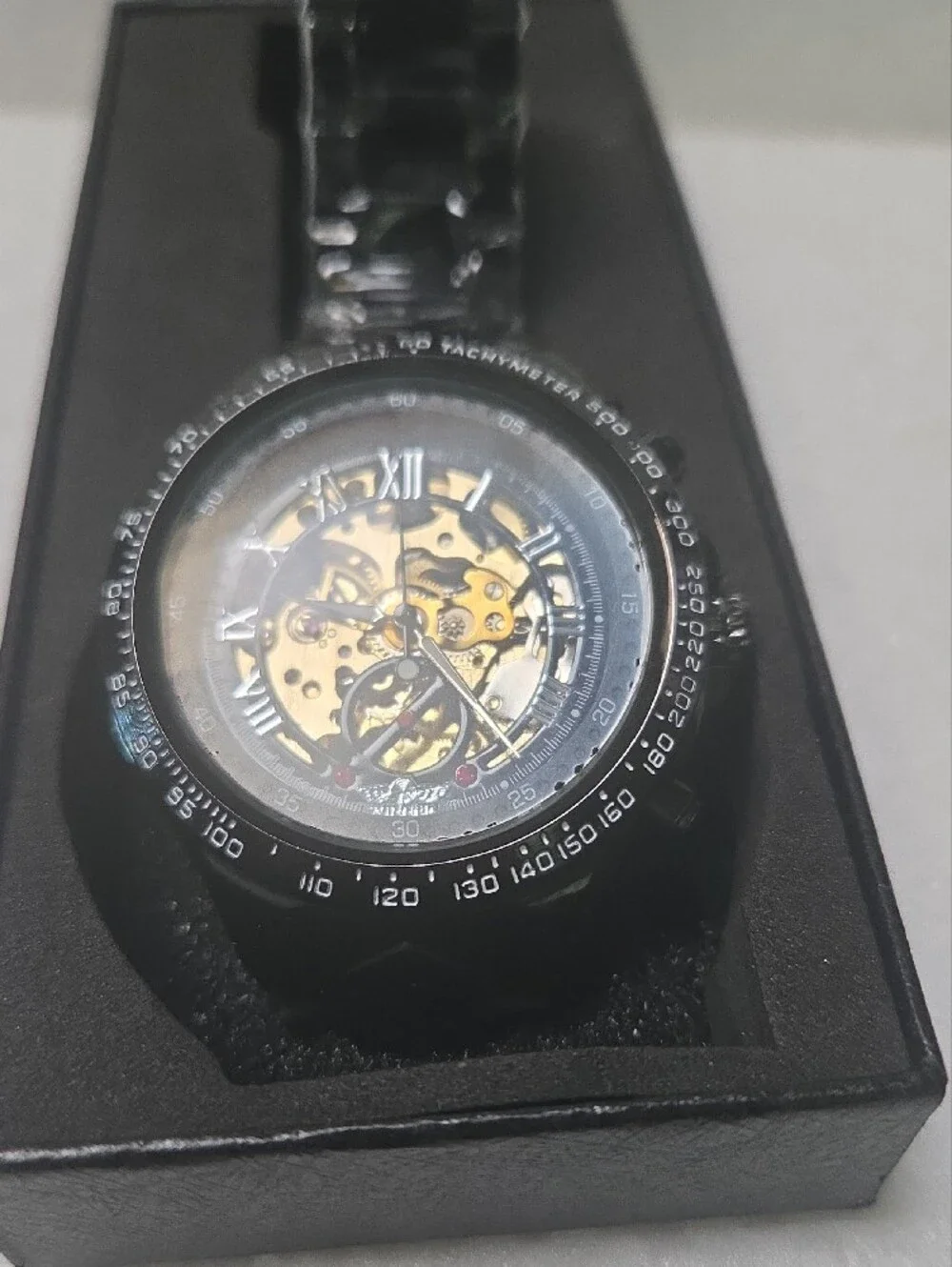 WINNER Black Skeleton Mechanical Watch with Tachymeter Bezel